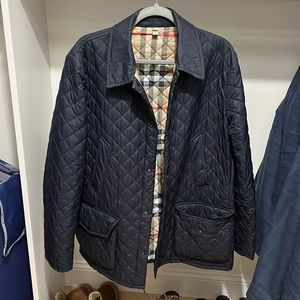 Men’s large Burberry jacket. In excellent condition, no tears or stains.
